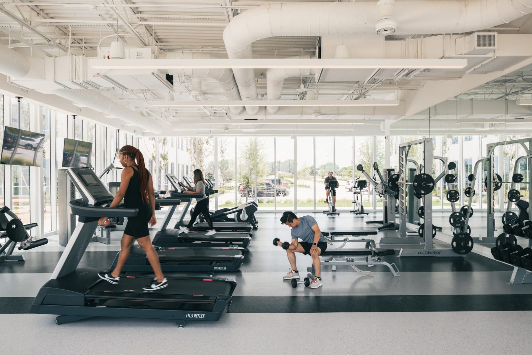 Fitness center inside the amenity center at 6221 W Plano Parkway