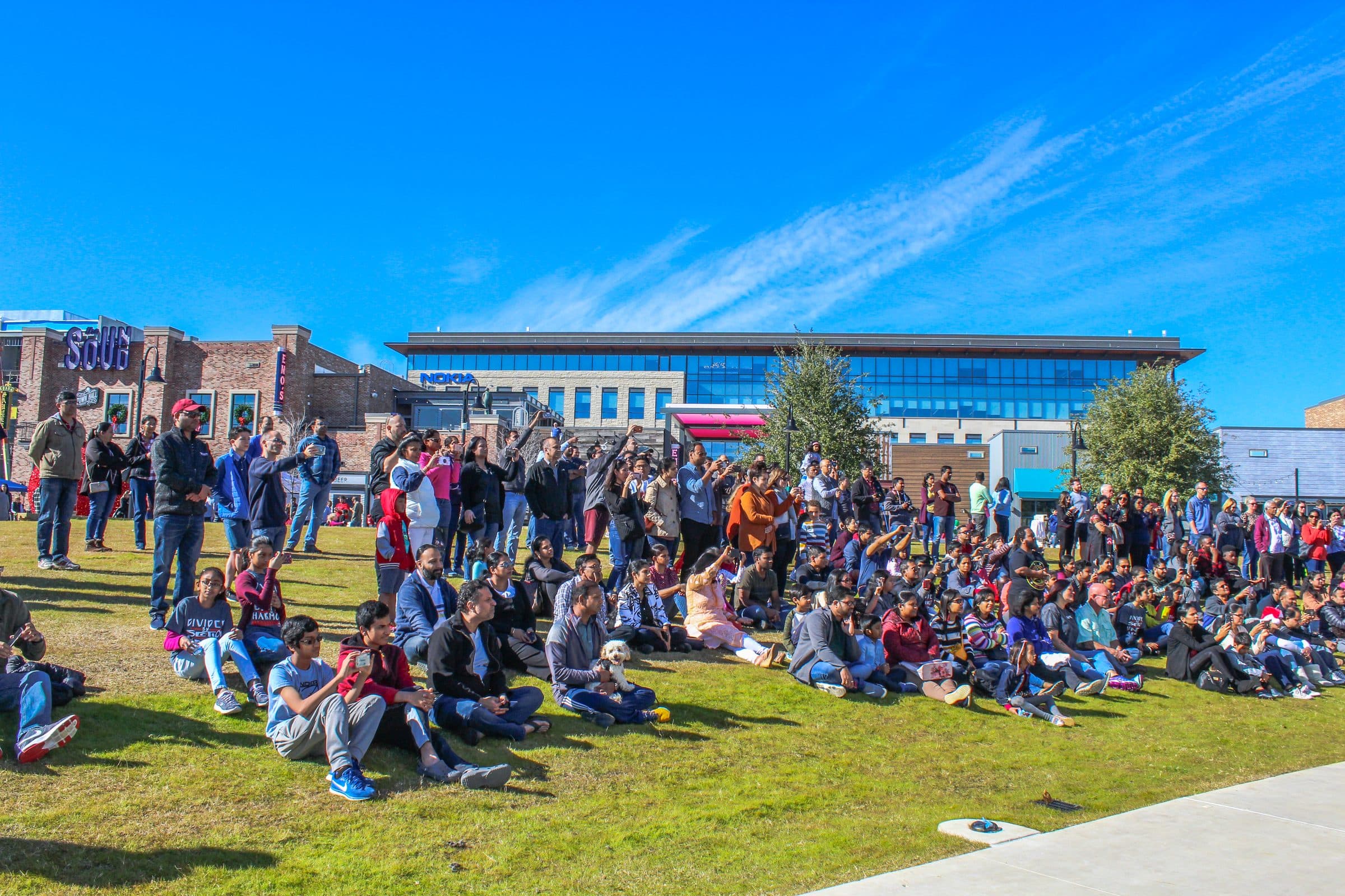 Holiday event crowd outdoors at The Sound at Cypress Waters
