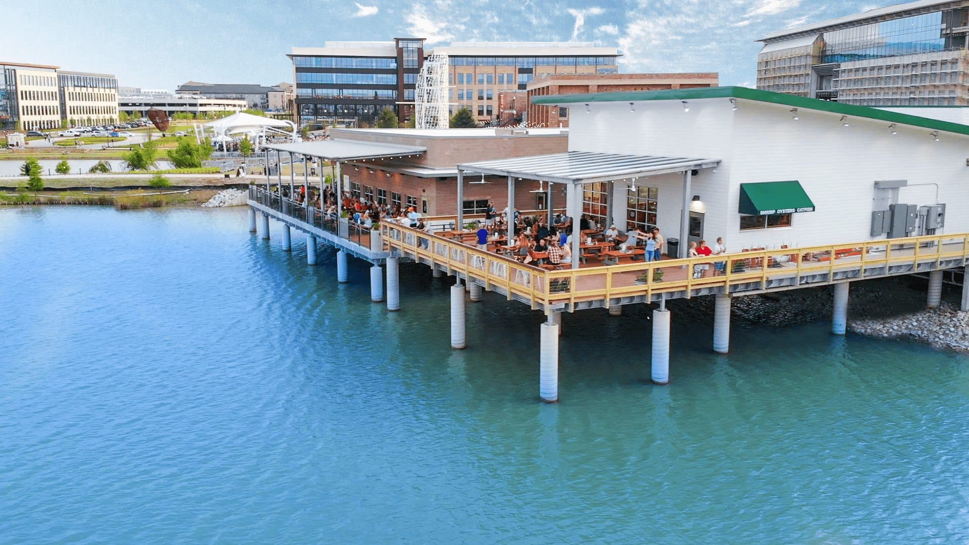 Restaurant patios on the lake at The Sound at Cypress Waters
